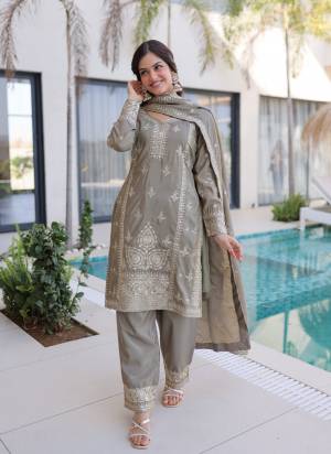 Attactive These Beautiful Looking Readymade Suit With Dupatta.These Top And Bottom Are Ho Silk And Dupatta is Fabricated On Ho Silk.Its Beautified With Designer Jari,Thread Embroidery Work.