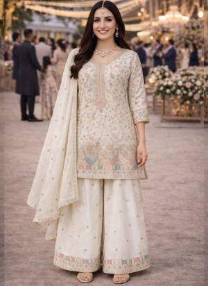 Garb These Party Wear Suit in Fine Colored Pair With Bottom And Dupatta.These Top Are Chinon And Dupatta Are Fabricated On Chinon Pair With Chinon Bottom.Its Beautified With Heavy Designer Embroidery Work.