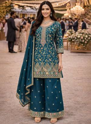 Garb These Party Wear Suit in Fine Colored Pair With Bottom And Dupatta.These Top Are Chinon And Dupatta Are Fabricated On Chinon Pair With Chinon Bottom.Its Beautified With Heavy Designer Embroidery Work.