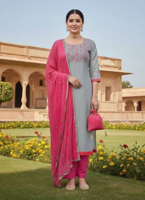 Garb These Disigner Suit in Fine Colored Pair With Bottom And Dupatta.These Top Are Cotton Slub And Dupatta Are Fabricated On Nazmin Pair With Cotton Bottom.Its Beautified With Designer Embroidery Work.