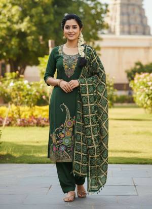 Looking These Disigner Suit in Fine Colored Pair With Bottom And Dupatta.These Top Are Banarasi Silk And Dupatta Are Fabricated On Chinon Pair With Santoon Bottom.Its Beautified With Woven Meenakari Designer With Printed Dupatta.