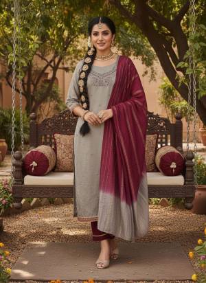 Garb These Disigner Suit in Fine Colored Pair With Bottom And Dupatta.These Top Are Coco Silk And Dupatta Are Fabricated On Jari Jacquard Pair With Cotton Bottom.Its Beautified With Designer Embroidery Work,Saburi Printed Dupatta.