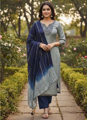 Garb These Disigner Suit in Fine Colored Pair With Bottom And Dupatta.These Top Are Coco Silk And Dupatta Are Fabricated On Jari Jacquard Pair With Cotton Bottom.Its Beautified With Designer Embroidery Work,Saburi Printed Dupatta.