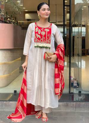 Looking These Suit in Fine Colored Pair With Bottom And Dupatta.These Top Are Silk And Bottom Are Fabricated On Silk Pair With Jacquard Silk Dupatta.Its Beautified With Designer Embroidery Work.