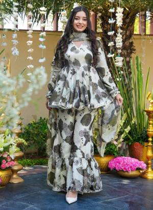 Looking These Suit in Fine Colored Pair With Bottom And Dupatta.These Top Are Rayon And Bottom Are Fabricated On Rayon Pair With Rayon Dupatta.Its Beautified With Designer Printed.