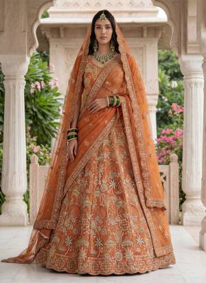 For A Fancy Designer Look,Grab These Lehenga Choli With Dupatta in Fine Colored.These Lehenga And Choli Are Silk And Dupatta Are Fabricated On Soft Net Pair.Its Beautified With Fancy Chappat Jari,Golden Dori,Thread,Sequance Embroidery,Diamond Work. 