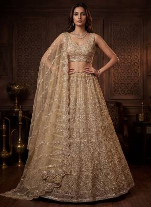 For A Fancy Designer Look,Grab These Lehenga Choli With Dupatta in Fine Colored.These Lehenga And Choli Are Net And Dupatta Are Fabricated On Soft Net Pair.Its Beautified With Fancy Crystal Motif,Thread,Sequance Embroidery,Crystal Pipe Work. 