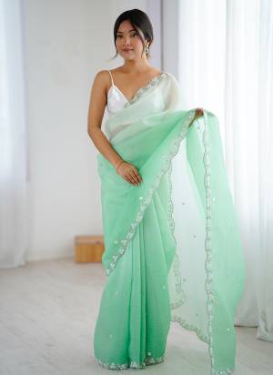 Looking These Party Wear Saree in Fine Sheded Colored.These Saree Are Chiffon Crush And Blouse is Ultra Satin Fabricated.Its Beautified With Sheded Color With Designer Sequance,Moti Cut Dana Work.