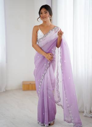 Looking These Party Wear Saree in Fine Sheded Colored.These Saree Are Chiffon Crush And Blouse is Ultra Satin Fabricated.Its Beautified With Sheded Color With Designer Sequance,Moti Cut Dana Work.