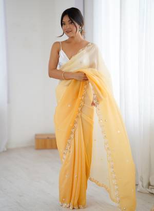 Looking These Party Wear Saree in Fine Sheded Colored.These Saree Are Chiffon Crush And Blouse is Ultra Satin Fabricated.Its Beautified With Sheded Color With Designer Sequance,Moti Cut Dana Work.