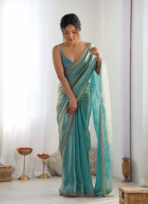 Garb These Party Wear Saree in Fine Colored.These Saree Are Fendy Satin And Blouse is Fendy Satin Fabricated.Its Beautified With Designer Sequance Embroidery Cut Work.