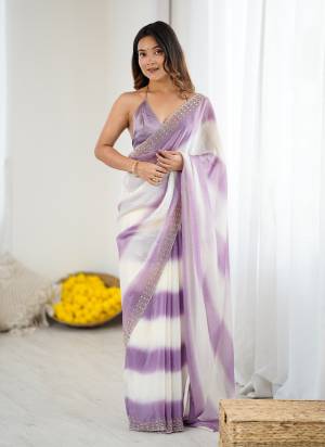 Attractive These Fancy Party Wear Saree in Fine Pedding  Colored.These Saree Are Fendy Satin And Blouse is Ultra Satin Fabricated.Its Beautified With Peding Color,Designer Jarkan Diamond Work Border .
