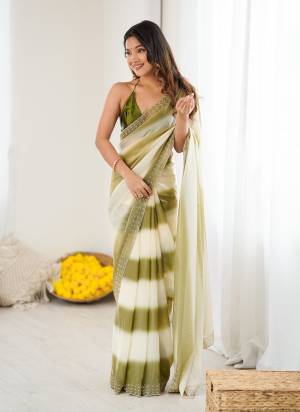 Attractive These Fancy Party Wear Saree in Fine Pedding  Colored.These Saree Are Fendy Satin And Blouse is Ultra Satin Fabricated.Its Beautified With Peding Color,Designer Jarkan Diamond Work Border .