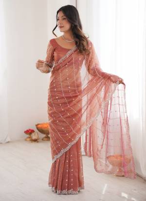 Attractive These Fancy Party Wear Saree in Fine Two Tone Colored.These Saree Are Twill Net And Blouse is Twill Net Fabricated.Its Beautified With Two Tone Color,Designer Sequance,Cut Dana Work.