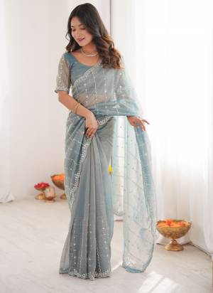 Attractive These Fancy Party Wear Saree in Fine Two Tone Colored.These Saree Are Twill Net And Blouse is Twill Net Fabricated.Its Beautified With Two Tone Color,Designer Sequance,Cut Dana Work.