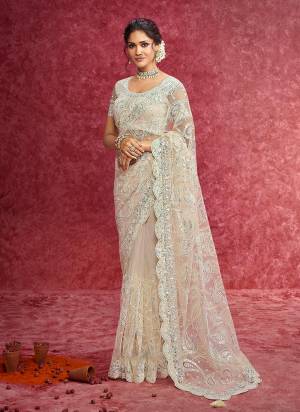 Looking These Fastival Wear Designer Saree in Fine Colored.These Saree Are Net And Blouse is Fabricated On Silk.Its Beautified With Designer Heavy Embroidery Work.