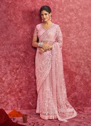 Looking These Fastival Wear Designer Saree in Fine Colored.These Saree Are Net And Blouse is Fabricated On Silk.Its Beautified With Designer Heavy Embroidery Work.