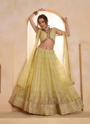 For A Different Look,Grab These Party Wear Designer Lehenga in All Over Pretty Colored Pair With Blouse And Dupatta.These Lehenga Choli And Dupatta is All Over Butterfly Net Base Fabric With Designer Tone To Tone Thread,Sequance Embroidery Work.