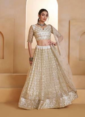 For A Different Look,Grab These Party Wear Designer Lehenga in All Over Pretty Colored Pair With Blouse And Dupatta.These Lehenga Choli And Dupatta is All Over Butterfly Net Base Fabric With Designer Tone To Tone Thread,Sequance Embroidery,Beads Work.