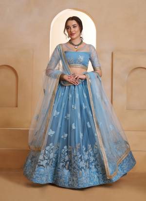 For A Different Look,Grab These Party Wear Designer Lehenga in All Over Pretty Colored Pair With Blouse And Dupatta.These Lehenga Choli And Dupatta is All Over Butterfly Net Base Fabric With Designer Tone To Tone Thread,Sequance Embroidery,Beads Work.