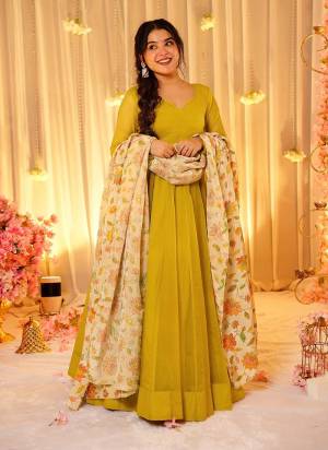 Garb These Beautiful Looking Readymade Gown With Dupatta.These Gown Are Soft Silk Fabricated On Tabby Silk Dupatta.Its Beautified With Solid With Designer Digital Printed.