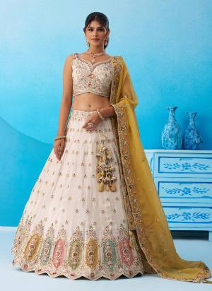 Attrective Looking This Party Wear Fine Color Fancy Heavy Designer Choli And Lahenga Fabriced On Tissue And Dupatta Tissue In Fabricated Beautified With Attrective Designer Sequance Embroidery,Hand Work. Buy Now.