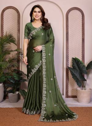 Attrective These Party Wear Saree in Fine Colored.These Saree Are Satin Chiffon And Blouse is Satin Chiffon Fabricated.Its Beautified With Designer Embroidery Cut Work.