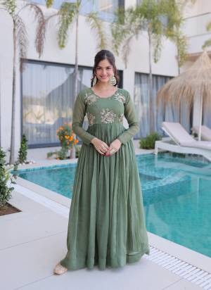 Attactive These Beautiful Looking Readymade Long Gown.These Gown Are Silver Crunchy Fabricated.Its Beautified With Designer Beads Embroidery Work.