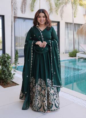 Garb These Beautiful Looking Party Wear Readymade Long Gown With Dupatta.These Gown Are Rangoli Crush And Dupatta is Fabricated On Rangoli Crush.Its Beautified With Designer Sequance,Thread Embroidery Work.