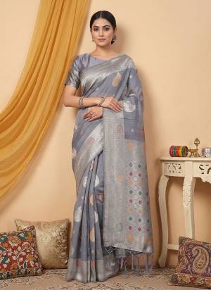 Garb These Fastive And Party Wear Saree in Fine Colored.These Saree And Blouse is Fabricated On Linen Cotton.Its Beautified With Woven Jacquard Designer.