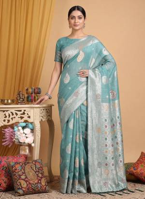 Garb These Fastive And Party Wear Saree in Fine Colored.These Saree And Blouse is Fabricated On Linen Cotton.Its Beautified With Woven Jacquard Designer.