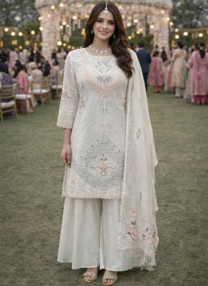 Attractive These Beautiful Looking Readymade Sharara Suits.These Top And Dupatta Are Georgette And Bottom Are Georgette Fabricated.Its Beautified With Disigner Heavy Thread,Moti Embroidery Work.