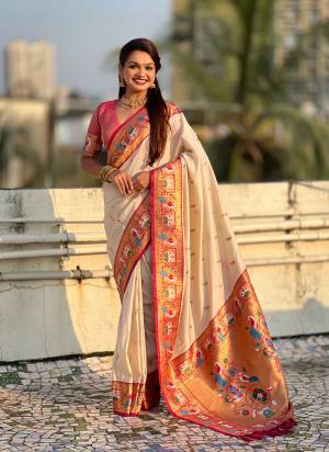 Looking These Party Wear Saree in Fine Colored.These Saree And Blouse is Fabricated On Paithani Silk.Its Beautified With Weaving Meenakari Peacock, Jari Designer.