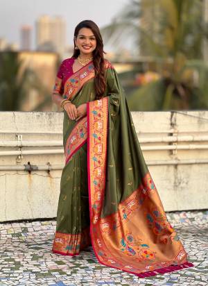 Looking These Party Wear Saree in Fine Colored.These Saree And Blouse is Fabricated On Paithani Silk.Its Beautified With Weaving Meenakari Peacock, Jari Designer.