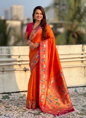 Looking These Party Wear Saree in Fine Colored.These Saree And Blouse is Fabricated On Paithani Silk.Its Beautified With Weaving Meenakari Peacock, Jari Designer.