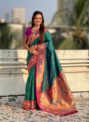 Looking These Party Wear Saree in Fine Colored.These Saree And Blouse is Fabricated On Paithani Silk.Its Beautified With Weaving Meenakari Peacock, Jari Designer.