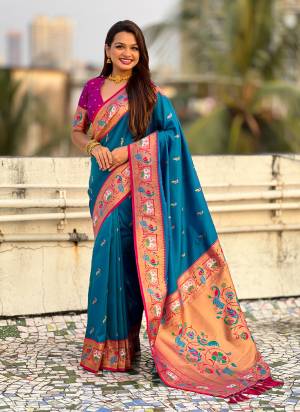 Looking These Party Wear Saree in Fine Colored.These Saree And Blouse is Fabricated On Paithani Silk.Its Beautified With Weaving Meenakari Peacock, Jari Designer.