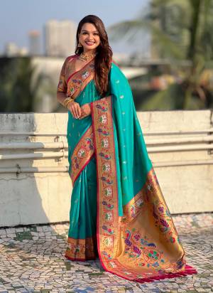 Looking These Party Wear Saree in Fine Colored.These Saree And Blouse is Fabricated On Paithani Silk.Its Beautified With Weaving Meenakari Peacock, Jari Designer.