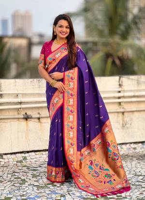 Looking These Party Wear Saree in Fine Colored.These Saree And Blouse is Fabricated On Paithani Silk.Its Beautified With Weaving Meenakari Peacock, Jari Designer.