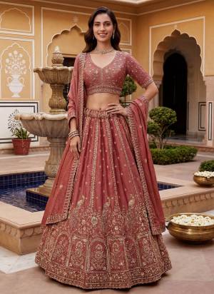 For A Fancy Designer Look,Grab These Lehenga Choli With Dupatta in Fine Colored.These Lehenga And Choli Are Fendy Organza Silk And Dupatta Are Fabricated On Fendy Organza Silk Pair.Its Beautified With Fancy Jari,Sequance Embroidery,Crystal Hand Work. 