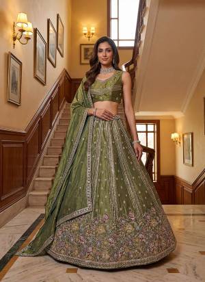 For A Fancy Designer Look,Grab These Lehenga Choli With Dupatta in Fine Colored.These Lehenga And Choli Are Fendy Organza Silk And Dupatta Are Fabricated On Fendy Organza Silk Pair.Its Beautified With Fancy Jari,Sequance,Multy Thread,Dori Embroidery Work. 