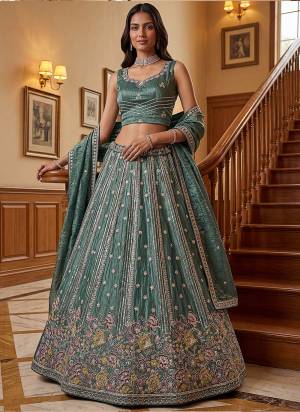 For A Fancy Designer Look,Grab These Lehenga Choli With Dupatta in Fine Colored.These Lehenga And Choli Are Fendy Organza Silk And Dupatta Are Fabricated On Fendy Organza Silk Pair.Its Beautified With Fancy Jari,Sequance,Multy Thread,Dori Embroidery Work. 