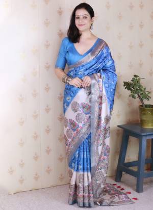 Attractive These Party Wear Saree in Fine Colored.These Saree And Blouse is Fabricated On Tussar Silk.Its Beautified With Wocen Jari Border Designer With Madhubani Digital Printed.