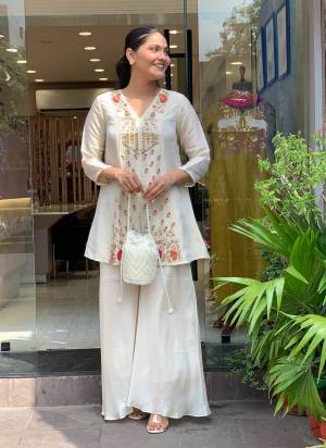 Looking These Suit in Fine Colored Pair With Top With Bottom.These Top Are Silk And Bottom Are Fabricated On Silk.Its Beautified With Designer Embroidery Work.