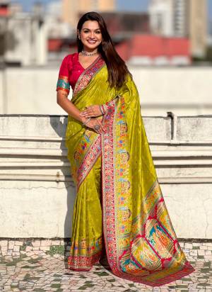 Looking These Party Wear Saree in Fine Colored.These Saree And Blouse is Fabricated On Viscose Silk.Its Beautified With Weaving Meenakari Jari Designer.