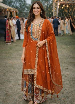 Attractive These Party Wear Suit in Fine Colored Pair Plazzo With Dupatta.These Top,Bottom And Dupatta Are Chinon Fabricated.Its Beautified With Designer Heavy Embroidery Work.