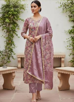 Garb These Suit in Fine Colored Pair With Bottom And Dupatta.These Top Are Modal Silk And Dupatta Are Fabricated On Nazmin Pair With Rayon Bottom.Its Beautified With Designer Printed, Hand Work.