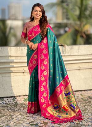 Looking These Party Wear Saree in Fine Colored.These Saree And Blouse is Fabricated On Soft Silk.Its Beautified With Weaving Lotus Meenakari Pallu,Border Designer.