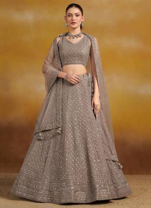 For A Designer Look,Grab These Party Wear Lehenga Choli in Fine Colored.These Lehenga And Blouse Are Fabricated On Georgette Pair With Dupatta Are Soft Net.Its Beautified With Thread,Sequance Embroidery Work.