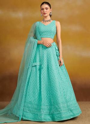 For A Designer Look,Grab These Party Wear Lehenga Choli in Fine Colored.These Lehenga And Blouse Are Fabricated On Georgette Pair With Dupatta Are Soft Net.Its Beautified With Thread,Sequance Embroidery Work.